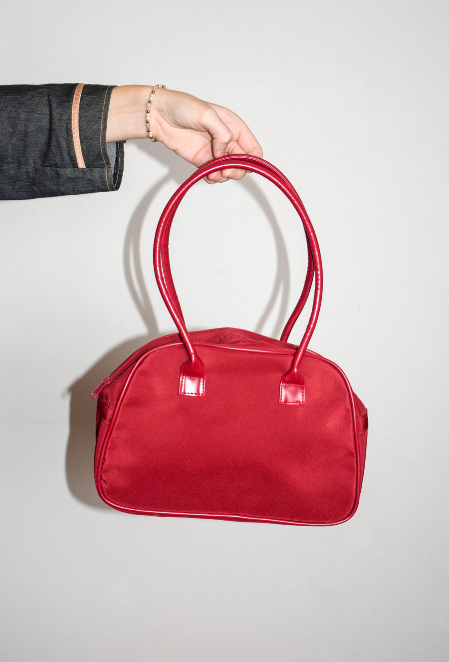 Red nylon shoulder bag