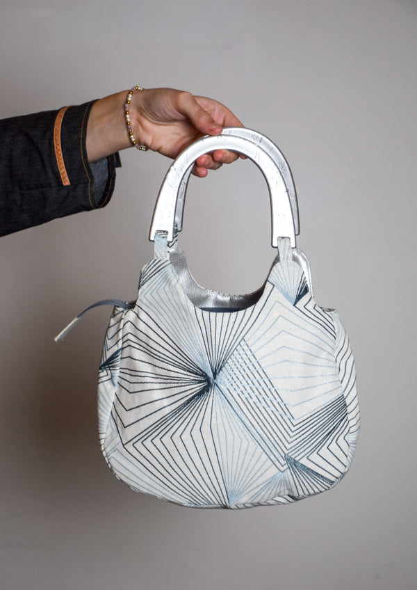 Silver and blue purse bag