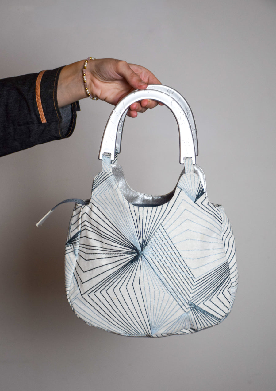 Silver and blue purse bag